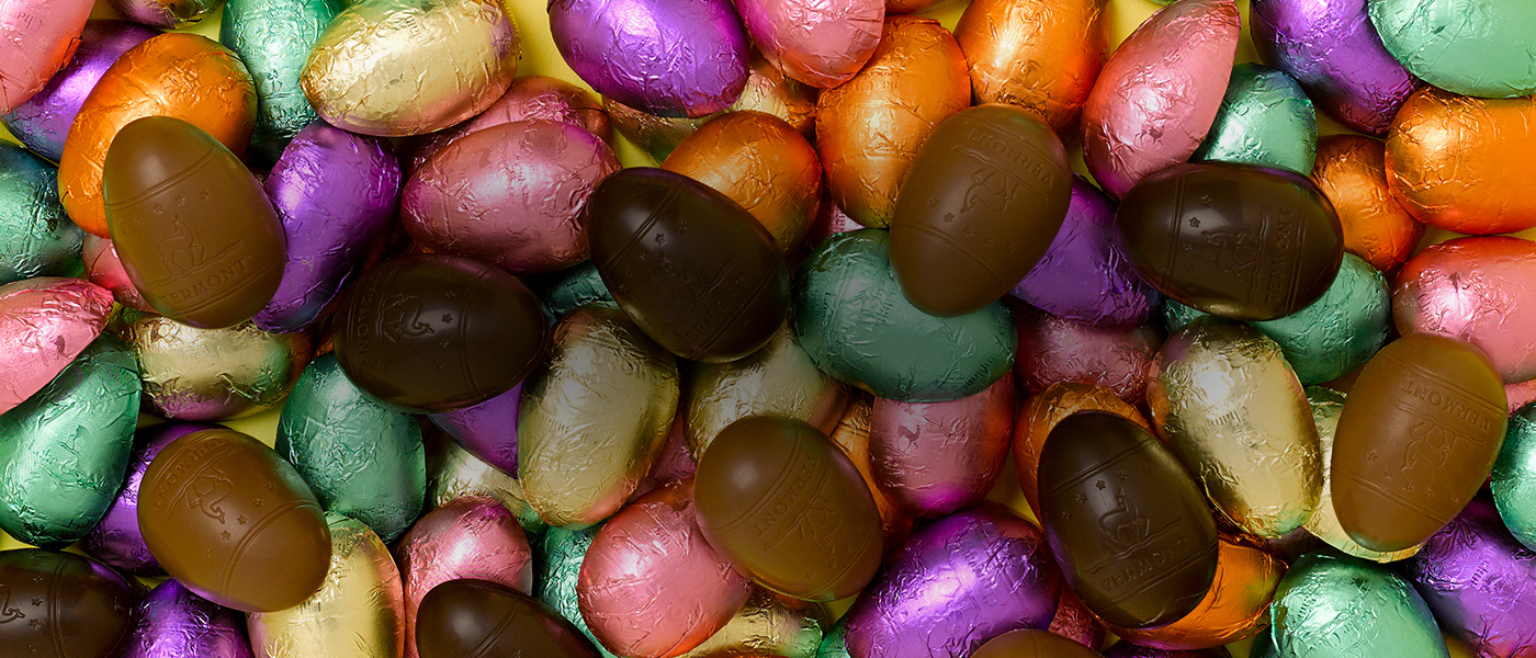 Assorted Easter chocolate bunnies, foil wrapped chocolate eggs, gourmet truffles, milk peanut butter cup and a honey caramel chocolates of Vermont piece. 