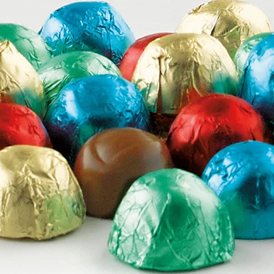 Assorted milk and dark chocolate jubilees wrapped in gold, blue, green, and red foils.