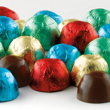 Assorted milk and dark chocolate jubilees wrapped in green, red, blue and gold foil.
