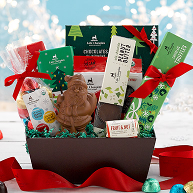 Assorted gourmet Christmas chocolates in a brown gift basket