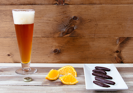 assorted chocolate truffles displayed on a slate plate