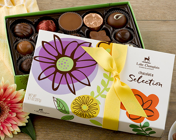 Assorted gourmet chocolates in a spring themed gift box