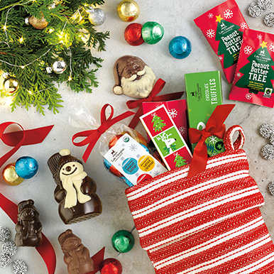 Assorted gourmet Christmas chocolates stuffed in a Christmas stocking