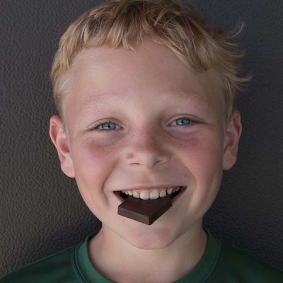 boy eating chocolate