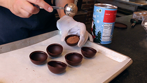 filling chocolate shell with hot chocolate mix