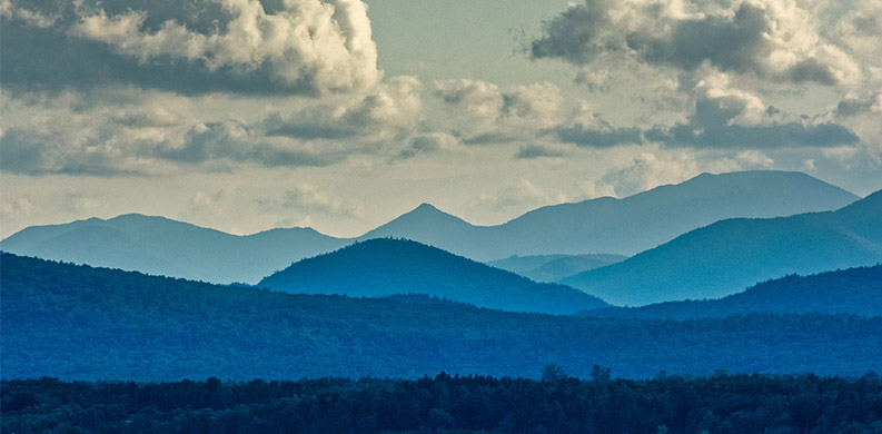 scenic view of lake champlain and mountains