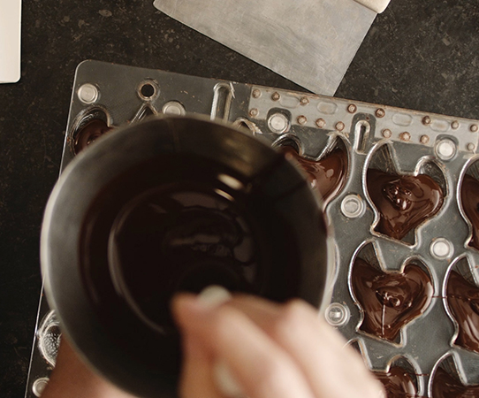 handcrafting Thanksgiving chocolate turkeys