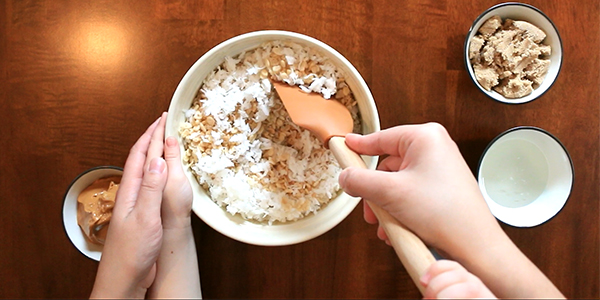 helping mix in the coconut nests