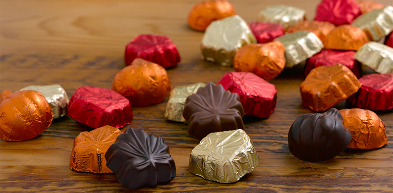 Fall foil-wrapped chocolate leaves and pumpkins