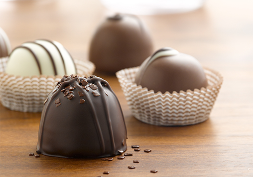 close-up of gourmet chocolate truffles on a table