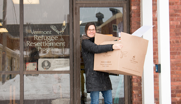 Susan delivering donations to the Vermont Refugee Resettlement Program