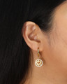 Emblem earrings on model