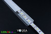 Multiple wide surface mounted LED profiles connected for extended linear lighting installation
