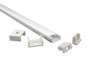 Surface mounted slim LED profile extrusion with diffuser end caps and mounting clips for complete installation