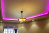 RGB LED strip ceiling cove lighting with purple ambient glow in modern interior design