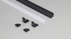 Black LED aluminium corner profiles with diffusers showing complete channel components and accessories