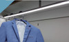 wardrobe hanging rail LED profile installed with clothes illuminated interior lighting