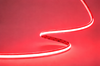 COB RGB LED strip lit in red along a curve volka