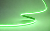 COB RGB LED strip lit in green along a curve volka