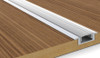 Recessed LED aluminium profile installed in timber surface with flush finish and integrated strip lighting