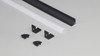 Black LED aluminium corner profiles with diffusers showing complete channel components and accessories