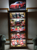 Glass display cabinet LED lighting with vertical strip illumination for retail display shelving and showcase cabinets