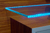 LED glass shelf lighting in display cabinet