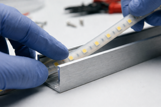 LED strip positions on a deck showing under stair treads, along handrail base, and perimeter border channels