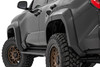 Bold Style Meets Real Protection: Elevate your 4Runner's presence and shield it from the elements with Rough Country's Sport Style Fender Flares. Offering an aggressive 5.75 inches of flare height, these flares deliver serious coverage against rocks, mud, and road debris perfect for off-road adventures or daily drives. Their bold, custom-molded design instantly upgrades your truck's look, and with paintable surfaces, you can color-match to your exact style. Stand out with confidence and rugged good looks that demand attention.Built Tough for Any Terrain: Crafted from ultra-durable Tri-Blend ABS, these fender flares are made to thrive in the harshest environments. Engineered exclusively for the third-generation Toyota 4Runner, they feature precise machine-formed construction and integrated UV protection to resist fading, cracking, or warping over time. Whether you're tackling backwoods trails or city streets, you'll have the confidence of gear that's built to last and built to impress.Quick Install, Long-Term Peace of Mind: These flares install easily with no cutting or trimming required, giving you a hassle-free upgrade that doesn't compromise your 4Runner's integrity. When it's time to revert to stock, they remove just as easily. Each set comes backed by a Rough Country 3-Year Limited Warranty, so you can hit the road or trail knowing your investment is protected. Transform your truck today with the perfect fusion of utility, performance, and head-turning style.