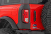 When you're hitting the trails in your Ford Bronco, the last thing you want is to worry about dings, dents, and scratches on your rear corners. Those tight spots, rocks, and branches can do some real damage. Rough Country Rear Corners are designed to protect your rig from the rough stuff so you can focus on the adventure without any worries.Solid Protection: Built from high-density thermoplastic, our Rear Corners are tough enough to handle whatever the trail throws at you. Keep your rear panels safe from nasty rock hits and rugged trail wear.UV Resistant: Made from high-density thermoplastic that's tough as nails and UV protected to keep it looking fresh even after years of off-road adventures.Quick and Easy Install: No drilling needed, just use the included 3M automotive adhesive for a quick install. And if you ever need to go back to stock, they're easy to remove without leaving any damage behind.3-Year Warranty: Built to last, these Rear Corners come with a 3-year limited warranty to back up their durability.These Rear Corners are perfect for anyone who loves pushing their Bronco to the limit but wants to keep it looking good while doing it. Whether you're dodging rocks in Moab or just fending off rogue shopping carts, we've got you covered.
