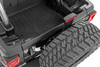 Your Jeep WranglerΓÇÖs tailgate takes a beatingΓÇöwhether itΓÇÖs hauling gear, tearing up trails, or handling everyday wear and tear. All that action can add up, leaving behind dents, dings, and scratches that make your tailgate look worse for wear. Rough CountryΓÇÖs Tailgate Protector is built to guard your tailgate from damage, letting you dive into every adventure without stressing over chipped paint or bent metal.Heavy-Duty Protection: Made from durable high-density thermoplastic, this tailgate protector is built to withstand the roughest trails and the harshest conditions, keeping your tailgate in mint condition no matter what.Fade-Resistant Finish: With its UV-resistant design, our protector keeps looking fresh, no matter how many sunny days your Jeep spends out on the trail.Easy 3M Adhesive Installation: No drilling, no headaches. Just peel and stick using the included 3M automotive adhesiveΓÇöeasy enough that youΓÇÖll spend more time wheeling and less time wrenching.Removable for Stock Look: Decided to sell or just want your Jeep looking factory fresh again? No worries. This tailgate protector can be removed, taking your ride back to stock without leaving any scars behind.3-Year Limited Warranty: We stand by our gear. With a 3-year limited warranty, you can hit the trail knowing weΓÇÖve got your back (and your tailgate).From hitting the trails to daily driving, our Tailgate Protector gives your Jeep the extra layer of protection it needs.