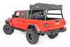 Upgrade Your Gladiator Bed: Rough Country's Bed Rack offers unmatched flexibility, allowing you to carry bulky cargo and outdoor equipment effortlessly in your truck bed. Whether you're loading ladders, roof racks, bikes, or more, this bed rack ensures your gear is secure and ready for any adventure. Ideal for camping trips or job sites, it keeps everything within reach and ready to go.Durable Style: Crafted from powder-coated aluminum, this bed rack offers both lightweight strength and long-lasting durability. The modular design allows for easy expansion, letting you add as many crossbars as you need. Molded end caps and T-slot covers contribute to a sleek, clean look while providing extra protection. Engineered to handle heavy payloads, this rugged bed rack combines functionality and style-making it the perfect solution for carrying your gear in style.Installation and Warranty: Designed with ease of use in mind, this bed rack offers endless mounting options and adjustability, ensuring a customizable fit for your unique needs. It also retains rear visibility, so you can maintain a clear view while driving. Backed by Rough Country's Limited Lifetime Warranty, you can rely on this bed rack to deliver dependable performance for years to come. Load up with confidence and hit the road knowing Rough Country has your back.