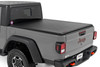 All-Weather Bed Protection: Rough Country's Soft Roll-Up Bed Cover delivers reliable protection against the elements while preserving full bed functionality. Constructed from high-quality, marine-grade vinyl with a sleek matte black finish, this durable cover features heavy-duty hook-and-loop side seals and tight front and rear barriers to shield your cargo from rain, dust, and debris.Streamlined Low-Profile Design: Sitting just 1-1/8" above the bed, this top-mount cover blends seamlessly with your truck's lines for a clean, stylish look. The corrosion-resistant, black powder-coated aluminum frame offers long-lasting strength without sacrificing style or aerodynamics.Fast and Easy Bed Access: The roll-up design and spring-latch closure system make opening and closing the cover a breeze. A single cable pull lets you release the latch quickly, giving you fast access to your full bed whenever you need it. Whether you're hauling gear or unloading tools, convenience comes standard.Effortless Installation: No drilling required - this cover installs in just 20 minutes using the included bracket system and tools. It mounts securely to your factory bed rails for a snug, hassle-free fit you can count on.Protected by a 5-Year Warranty: Rough Country backs this Soft Roll-Up Bed Cover with a 5-Year Replacement Warranty, protecting against structural and workmanship defects so you can hit the road with total confidence.