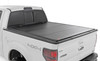 Elevate your F150's functionality and appearance with Rough Country's F-150 Hard Tri-fold Flip-up Bed Cover. Unlike traditional bed covers that limit access to your truck bed, our innovative Flip-up design grants you complete access to your truck bed, making it easier to load and unload large items.\
Full-Bed Access: With Rough Country's Tri-fold Flip-up Bed Cover, you can conveniently flip up the cover, allowing full-bed access without the hassle of removing the cover.\
Built to Last: Our bed cover is crafted from lightweight aluminum and boasts a resilient powder coat finish. This coating resists corrosion and wear, ensuring that your truck bed maintains its pristine appearance even in harsh weather conditions.\
Superior Water Drainage System: The bed rails of this bed cover feature an innovative water drainage system. No need to worry about water pooling on your cover or seeping into your truck bed.\
Premium Weather Seals: The Tri-fold cover also includes top-of-the-line weather-resistant seals that create a tight and secure barrier along the bed rails. These seals ensure your cargo remains protected from the elements, even in inclement weather.\
Secure Cargo Storage: Provide added security for your truck bed contents, deterring theft and protecting valuable items.\
Elevate your F-150ΓÇÖs truck bed and get full access, unmatched durability, and superior weather protection with Rough Country's Hard Tri-fold Flip-up Bed Cover!