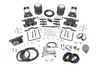 Ideal Leveling: Is your truck your workhorse? The main attraction of a pickup is the ability to haul and tow as needed. However, due to the weight in the bed or the condition of the rear leaf springs, your vehicle may become un-level under load. At Rough Country, we've designed a solution to eliminate these concerns. Introducing Rough Country's Rear Air Spring Kit.Heavy-Duty Construction: Rough Country's Rear Air Spring Kit includes two high-quality, double convoluted air bags, reinforced with durable powder-coated steel brackets and DOT-approved airlines. Whether you're towing a trailer or hauling heavy loads, this kit helps ensure your vehicle remains level, alleviating the strain on your trailer's tongue weight. The kit features 1/4" push-to-connect air fittings for easy installation, along with all necessary bracketry for a secure fit. Rough Country's Air Spring Kit supports up to 5,000 lbs of load, minimizing sway and preventing bottoming out while braking and steering.Easy Installation: Quick and simple setup for immediate use. Rough Country's kit can be installed at home with standard tools in just 5-6 hours, ensuring minimal downtime and fast, hassle-free installation.Onboard Air Compressor and Wireless Controller: For added convenience, Rough Country offers an optional onboard air compressor and wireless controller to easily adjust your air spring kit on the go. Control air pressure at the push of a button from the comfort of your vehicle.Reliable Warranty Coverage: Rough Country's Rear Air Spring Kit includes a limited lifetime warranty on the air springs and a two-year replacement warranty on the compressor, offering lasting protection against manufacturer defects. This industry-leading coverage ensures confidence in both quality and durability, so you can count on Rough Country to keep your truck performing at its best.