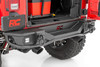 Innovative Design. Beef up your JKΓÇÖs rear end with Rough CountryΓÇÖs Tubular Rear LED Bumper! This stylish, durable steel bumper offers unbridled protection for the rear of your JK while giving you increased tire clearance for off-road articulation. With bold angles and contoured curves, this rear bumper is a true head-turner thatΓÇÖs sure to get attention.Stylish Features and Construction. Rough CountryΓÇÖs Rear Bumper features an all-steel construction for serious durability and comes coated in a corrosion-resistant, textured black powder coat to withstand the elements. This rear bumper offers a robust design and includes two 2" Black Series LED pods that boast 2880 lumens of raw power to ensure that you can see any obstacle behind you!\
Installation.┬áWith a no-cut or drilling required to install, installation couldn't be easier. With an estimated timeframe of 3-4 hours this full kit can be installed at home using standard tools and can be completed efficiently and quickly!\
Limited Lifetime Replacement Warranty. Rough Country's Tubular Rear LED Bumper is backed with a limited lifetime replacement warranty towards manufacturer defects. As such, the product is protected from structural and workmanship damage after the date of purchase. With our industry-leading warranty give yourself peace of mind when using Rough Country's Suspension products!