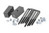 Has the rear of your vehicle started to sag, or are you looking to add a bit of lift height? Whatever the case maybe we have you covered at Rough Country. Upgrade your rear suspension with Rough Country's vehicle-specific block and u-bolt kit!\
Rough Country's rear block and u-bolt kits provide a simple remedy to an age-old problem that simply happens over the span of your vehicle lift. Each kit offers two nylon composite blocks that are tapered to reduce driveline angles, and are much stronger than the standard cast block option. These heavy-duty replacements feature a single pin measuring in a 9/16-inch to snuggle fit into your factory axle pad. Also included is a set of e-coated corrosion-resistant steel u-bolts. Our u-bolts offer four inches of thread ensuring that you have plenty of length to securely install this kit to the rear of your vehicle in no time flat.┬á\
Best of all, Rough Country's vehicle-specific kits are backed by Rough Country's Satisfaction Guarantee!┬á\
┬á