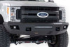 Transform the front end of your Ford Super Duty with Rough Country's Front LED Bumper, engineered to deliver aggressive styling, added protection, and unbeatable off-road illumination. This premium bumper upgrade instantly enhances your truck's appearance while boosting performance where it counts.Rugged Construction. Built to Last: Crafted from durable, all-steel construction and finished in a sleek flat black powder coat, this bumper is built to take on the elements and the trail. Whether you're navigating rough terrain or daily driving, it offers the strength and style your truck deserves.Unmatched Illumination: Light up the path ahead with over 15,000 lumens of combined lighting power. This bumper includes four Rough Country 2-inch LED Cubes and a powerful 20-inch LED Light Bar to give you crystal-clear visibility on or off the road.Tow-Ready Design: Retains your factory tow hooks for full utility and recovery capabilities - no compromise on function.Simple Installation: No Cutting. No Drilling. With a 100% bolt-on design, this bumper installs easily at home with standard tools - no cutting, no drilling, no hassle.Complete the Look: Pair it with Rough Country's Rear LED Bumper for a full front-to-back transformation that turns heads and performs under pressure.
