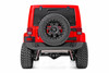 Beef up your JKΓÇÖs rear end with Rough CountryΓÇÖs Heavy-Duty JK Rear Bumper with Tire Carrier! This stylish, durable steel bumper offers unbridled protection for the rear of your JK while giving you increased tire clearance for off-road articulation. With bold angles and contoured curves, this rear bumper is a true head-turner thatΓÇÖs sure to get attention.Rough CountryΓÇÖs Rear Bumper features a 5/32ΓÇ¥ steel composition for serious durability and comes coated in a corrosion-resistant, textured black powdercoat to withstand the elements. Features a set of D-rings for easy winching or recovery in off-road environments.