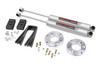 Lift your F-150 in style with Rough Country's sleek and durable 2" Lift Kit. This innovative kit combines great looks and exceptional strength, offering 2 inches of lift for improved off-road performance. Crafted from premium T6061 Billet Aluminum, this spacer ensures top-tier durability, resisting rust and corrosion even in harsh weather conditions.Effortless Bolt-On Installation: The easy-to-install, 100% bolt-on design makes upgrading your ride a breeze. No cutting or welding required - install in no time using common tools!Preserves Factory Ride Quality: Maintain the smooth, factory ride you love while gaining added height for improved clearance and off-road performance.Boosts Ground Clearance: Perfect for off-road enthusiasts, this kit increases ground clearance, giving you the ability to tackle tougher terrain and fit larger tires.Preserves Factory Rake: Maintain your vehicle's original stance and appearance, with no modification needed to the rear height.No Strut Disassembly Required: Save time with a simple installation that doesn't require disassembling your factory strut assembly.Includes Rough Country's N3 Rear Shocks: This kit comes complete with Rough Country's N3 rear shocks for enhanced ride quality and improved suspension performance. These premium shocks are engineered to deliver superior damping, increased stability, and all-terrain comfort, making your F-150 ready for any adventure right out of the box.Rough Country's specially designed spacer pattern ensures proper clearance between the upper control arm and the strut, with a unique driver and passenger side design. This kit allows you to run up to 33-inch tires, giving your truck an aggressive, off-road-ready look.