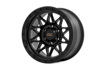 Take your off-road rig to the next level with a wheel designed for adventure and built to perform. The Rough Country 78 Series wheel combines bold aesthetics with rugged functionality, making it the ultimate choice for off-road enthusiasts.Aggressive Semi Gloss Black Finish: Perfectly complements the tough, trail-ready look of your vehicle.Simulated Beadlock Design: Gives your rig that hardcore off-road styling while maintaining easy installation.Unmatched Strength & Lightweight Performance: Precision-engineered from a single piece of premium aluminum for unbeatable durability without adding extra weight.Premium Details: Includes a Rough Country black center cap with standout bronze lettering for a clean, custom touch.Trail-Tested Durability: Backed by a 1-year finish warranty and a Limited Lifetime Structural Warranty to handle whatever the trails throw your way.Whether you're tackling rugged terrain or just want to stand out from the crowd, these wheels are built to deliver. Gear up and conquer the trails in style with Rough Country!