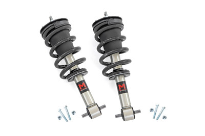 Improved Stance, Balance, and Handling.ΓÇ»If you want to improve your vehicle's on-road performance and off-road capabilities, Rough Country's M1 Strut Leveling Kits are the way to go. Our M1 Leveling Struts help stabilize your vehicle's movements, enhancing control when you turn, brake, accelerate or ride over uneven road surfaces. As an adjustable ride height strut, these M1ΓÇÖs keep your suspension from overextending, providing a more consistent ride. Made for rugged off-road performance, our M1 monotube struts have a 46mm digressive piston for a more stable ride, preserving the smooth ride quality you need.\
Quality Construction.ΓÇ»Rough Country's M1 Monotube Leveling Struts have been engineered to give you the most reliable performance, increased driving comfort, and all-around performance for your vehicle. Made from 2" seamless extruded tubing and feature durable vulcanized natural rubber bushings. They're also zinc plated for resistance against the elements. Plus, they're adjustable in height. Utilizing multiple grooves in the strut body the spring perch can be raised or lowered to achieve two inches of lift down to a stock height replacement. So whether you're looking to add a little extra clearance for off-roading or just want your ride to sit a little higher, our M1 Monotube Leveling Struts are the perfect solution.\
Installation and Warranty. This bolt-on installation requires just basic tools and about 2-3 hours to complete. Our Strut Kit is backed with a limited lifetime replacement warranty towards manufacturer defects. As such, the product is protected from structural and workmanship damage after the date of purchase. With our industry-leading warranty, give yourself peace of mind when using Rough Country's products!