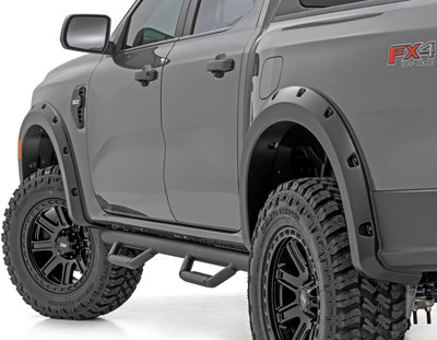 Add aggressive good looks quickly and easily with Rough Country's Fender Flares. Nothing compliments a new lift, wheels, and tires like a set of stylish, mean-looking fender flares. Rough Country's Fender Flares are designed with a simulated riveted look. These fender accessories bolt-on quickly and easily in a few secure mounting points, making installation a cinch. No cutting or drilling is required to install, and these flares can be easily removed and return your truck to stock! These UV treated fender flares ship in flat-black or can easily be painted to match your vehicle, and are designed to withstand the sun, rain and other elements of nature. Rough Country Fender Flares are guaranteed to be free of defects for 3 years!