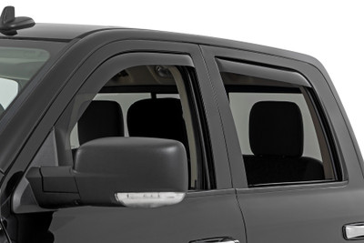 Upgrade your driving comfort with Rough Country's premium in-channel wind deflectors, designed for easy installation and exceptional performance. They fit seamlessly into your vehicle's window channels maintaining a sleek profile while letting you enjoy fresh air in any weather. Say goodbye to noisy wind and turbulence for a quieter cabin on city commutes or road trips. Our deflectors reduce glare and keep your interior dry with windows cracked open. They blend seamlessly with your vehicle's design for a stylish look and are custom-made for a perfect fit and reliable performance, ensuring every drive is comfortable and enjoyable.
