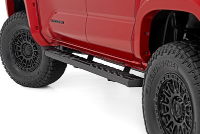 Ease of Access. Gain easier access to your cab with Rough Country's BA2 Running Board Side Steps. These high-quality replacements are a must-have for any lifted application. Offering a robust design and ample stepping area, your footing has never been safer.\
Durable Construction. Rough Country's BA2 Running Board Steps feature a comfortable, 5-inch wide stepping area with an integrated insert design that ensures foot placement when climbing in and out of your vehicle. Each running board features a durable powder-coated finish and a nonslip design that can support up to 500lbs!\
Installation.┬áWith no cutting or drilling required to install, installation couldn't be easier. With an estimated timeframe of 1-2 hours this full kit can be installed at home using standard tools and can be completed efficiently and quickly!\
5-Year Replacement Warranty. Rough Country's BA2 Running Board Side Steps is backed with a five-year replacement warranty towards manufacturer defects. As such, the product is protected from structural and workmanship damage after the date of purchase. With our industry-leading warranty give yourself peace of mind when using Rough Country's Suspension products!┬á