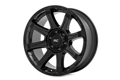 Transform your vehicle into a standout with the Rough Country 81 Series Wheel. This wheel combines high performance with captivating style, making it a must-have for any off-road vehicle that craves attention.Semi Gloss Black Finish: The eye-catching 8-spoke design in a semi gloss black finish ensures your vehicle looks stunning whether you're on the trail or the highway.Accent Bolts on the Outer Lip: Emphasize your vehicleΓÇÖs ruggedness and add a fierce, aggressive look to your wheels. This design demands attention.Single-Piece Aluminum Construction: Crafted from high-strength aluminum, these wheels are engineered to withstand the toughest terrains, ensuring you have a reliable companion on your off-road adventures.Rough Country Black Center Cap: The stylish black center cap finishes off the look, ensuring your wheels are as cohesive as they are striking.Warranty: Drive with confidence knowing your investment is protected by a 1-year finish warranty and a Limited Lifetime Structural Warranty.For the off-road enthusiast who wants to combine rugged capability with standout style, the Rough Country 81 Series Wheel is the ultimate choice. Hit the trails with confidence and make a statement wherever you go.