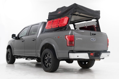 Upgrade your F-150 Bed. The F-150 Bed Rack from Rough Country gives you the flexibility to carry bulky cargo and outdoor equipment in your truck bed. It's just right for loading ladders, roof racks, bikes, and more with ease. And whether you're headed out for a camping trip or working under the sun on a job site, this bed rack keeps all your equipment close at hand.\
Durable Style: This innovative bed rack system is built from durable powder-coated aluminum for lightweight strength and durability. The modular design allows you to add as many crossbars as needed, and the molded end caps and T-slot covers give your truck that clean look you're looking for. Rugged enough to handle any payload you can throw at it; our bed rack is sure to turn headsΓÇöand help you carry your gear wherever you need it.\
Installation and Warranty: This easy-to-install rack offers endless mounting options and adjustability, so you can customize it to suit your specific needs. It also retains rear visibility, making it the perfect choice for those who want to maintain a clear view while driving. Plus, it comes with Rough Country's Limited Lifetime Warranty, so you can rest assured that it's built to last. So, load up and hit the road with confidence, knowing that Rough Country has you covered.