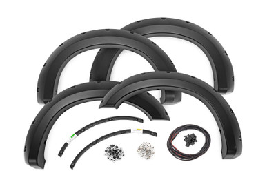 Add aggressive good looks quickly and easily with Rough Country's Fender Flares. Nothing compliments a new lift, wheels, and tires like a set of stylish, mean-looking fender flares. Rough Country's Fender Flares are designed with a simulated riveted look. These fender accessories bolt-on quickly and easily in a few secure mounting points, making installation a cinch. No cutting or drilling is required to install, and these flares can be easily removed and return your truck to stock! These UV treated fender flares ship in flat-black or can easily be painted to match your vehicle, and are designed to withstand the sun, rain and other elements of nature. Rough Country Fender Flares are guaranteed to be free of defects for 3 years!