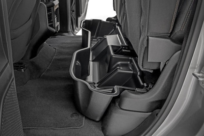 Clean up the contents of your cab with Rough CountryΓÇÖs Custom-Fit Under Seat Storage Compartment. These handy underseat truck storage compartments offer an easy way to store your gear with a custom, contoured look that blends in seamlessly with your vehicleΓÇÖs factory design. Keep your tools, gear, and other odds and ends organized and stowed away while conveniently stowed away under the rear seats.\
Each under-seat storage tray is constructed from a durable, high-density thermoplastic material thatΓÇÖs built to withstand kicks, nicks, and corrosion. A convenient anti-skid surface helps prevent the contents of your underseat cargo tray from rolling around while driving. Best of all, Rough CountryΓÇÖs Custom-Fit Under Seat Storage Compartments are easy to install, so you can upgrade your cargo management quickly and easily!