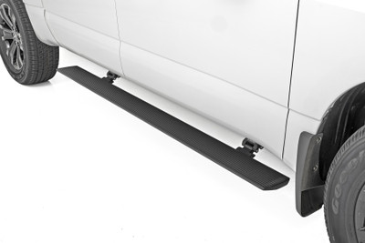 Step up in style.ΓÇ»Sidesteps have come a long way, and now we've taken them to the next level with Rough Country'sΓÇ»Power Running Boards! These retractable E-Boards tuck tightΓÇ»for a clean look when not in use and automatically extend when the door is opened. With an anti-slip surface that provides a secure stepping area, getting in and out of your ride has never been easier.ΓÇ»Our Power Running Boards alsoΓÇ»include LED lights that provide illumination when deployed and shut off when steps are closed, providing a sleek, aerodynamic look.\
ΓÇ»Premium Construction. The Rough Country E-Board Steps combine durability, strength, and style. These 6" all-season steps are made from lightweight yet durable aluminum and can support up to 660 lbs per side. Equipped with dual motor technology, these steps can handle anything Mother Nature throws their way. They feature an automatic 'SAFE-STOP' mechanism that engages if a blockage is detected and include an interior bypass switch for manual override. So whether you're heading out on a weekend errand or loading up for a camping trip, our electric steps offer reliable protection for all your adventures.\
Installation.ΓÇ»These easy-to-install steps are the perfect solution for getting in and out of your vehicle. No drilling is required for installation, and the steps tuck tight under the rocker panelΓÇ»when not in use. Don't struggle to get in and out of your vehicle anymore. Make life easier with Rough Country's Power Running Boards.\
Warranty. Rough Country backs its products with a limited lifetime replacement warranty. Our products are protected from structural and workmanship damage after purchase. Our industry-leading warranty gives you peace of mind when using Rough Country products!